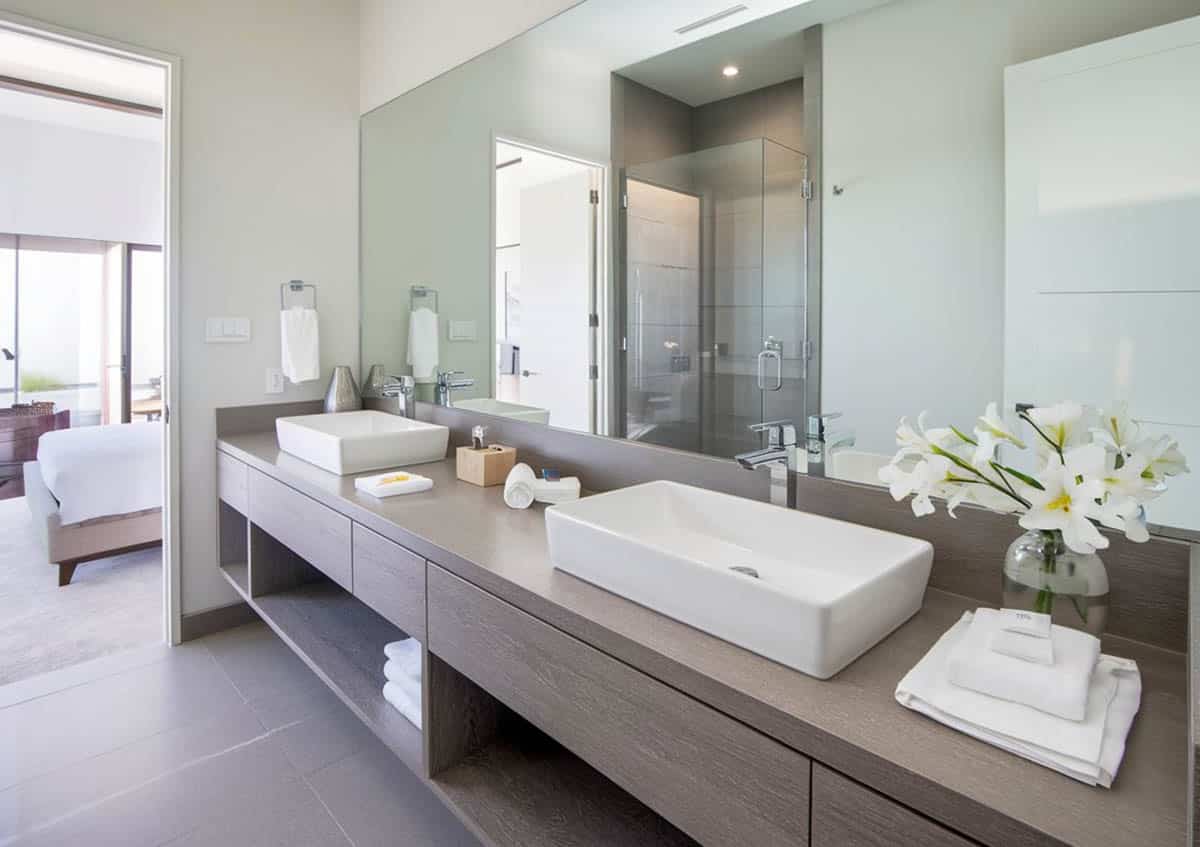 Bathroom with large vanity and vessel sinks