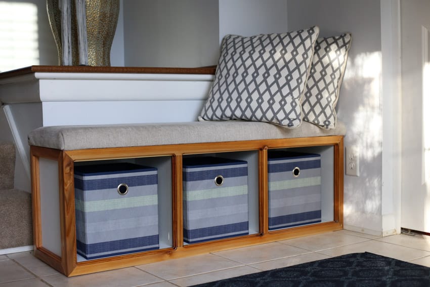 Bedroom with cube storage as changing table mattress, and pillows